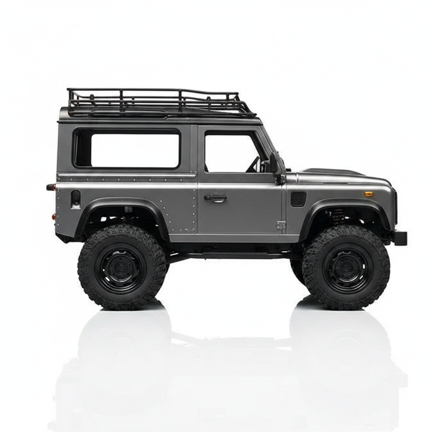 Crawler MN99S Defender en franchissement de rochers